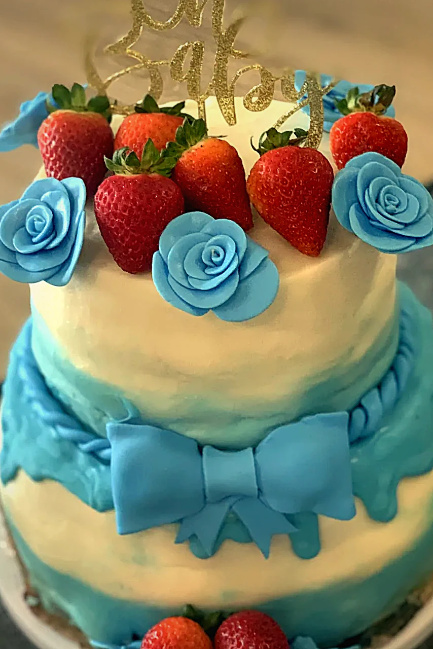 A tiered fondant celebration cake